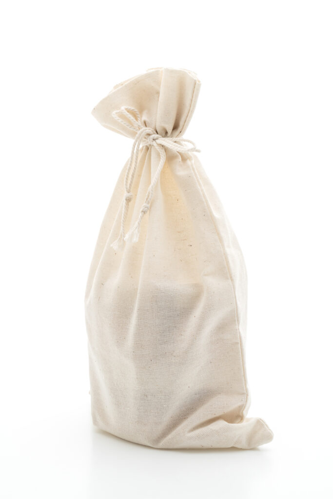 white fabric bag isolated on white background